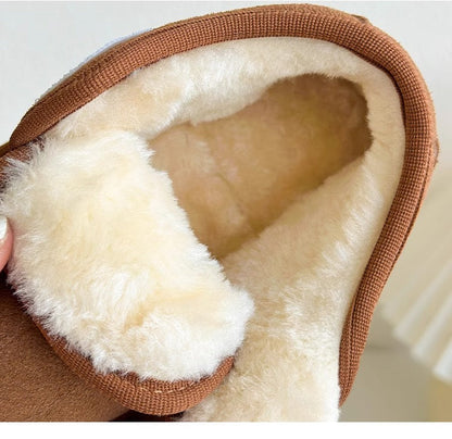 Cozy, brown toddler winter boots with simple Velcro fastening for independent little ones.