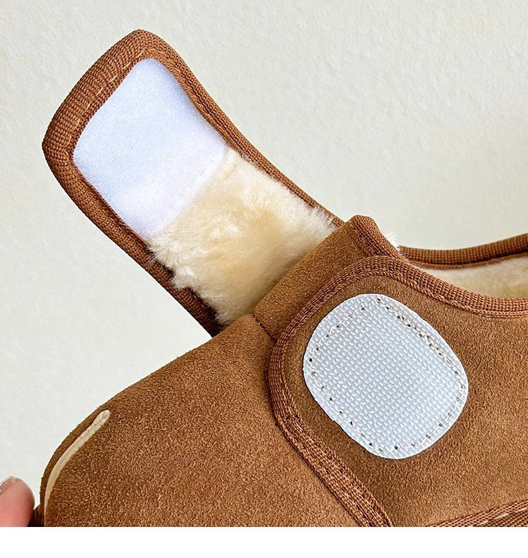 Kids' warm beige boots, velcro-adjustable for a snug fit, great for winter footwear.