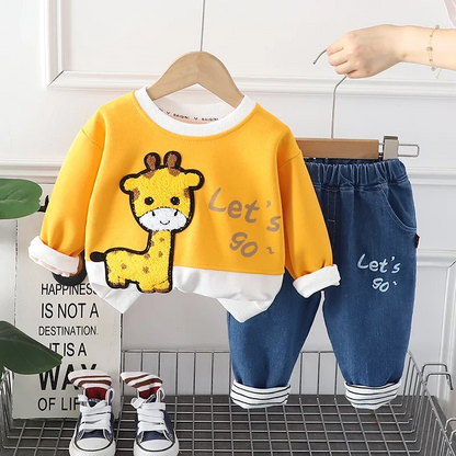 Stylish kids winter hoodie and pants set in green displayed on a hanger, ready for play