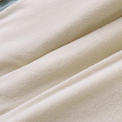 Detailed shot of zipper and pockets on a child's winter parka, practical and warm