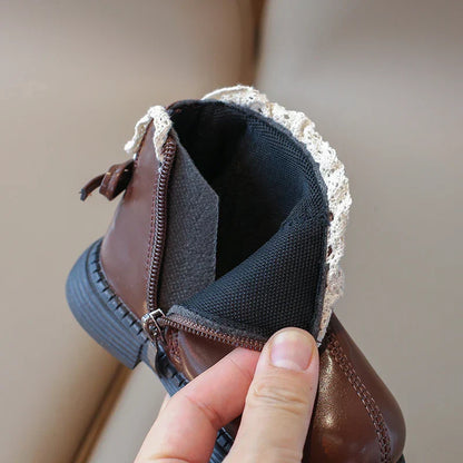 Children's warm leather footwear, slip-resistant, designed for cold weather play