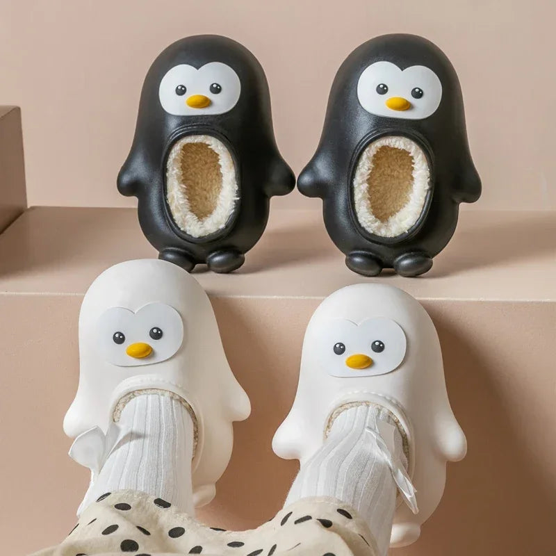 Warm, cozy plush penguin slippers for children, perfect for indoor wear