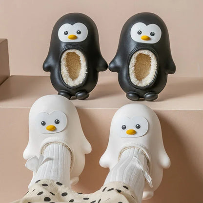 Warm, cozy plush penguin slippers for children, perfect for indoor wear