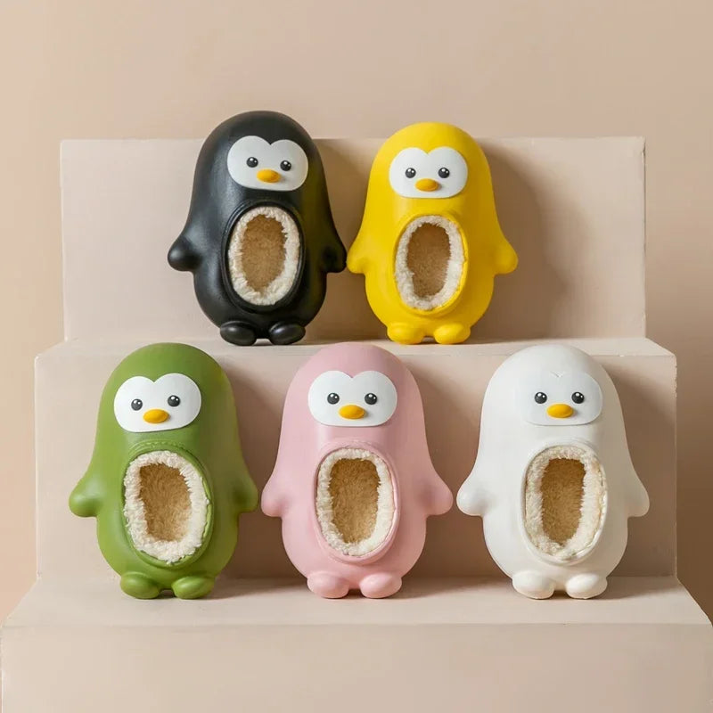 Plush penguin slippers for kids, featuring a non-slip sole for safety