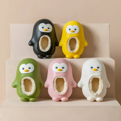 Plush penguin slippers for kids, featuring a non-slip sole for safety