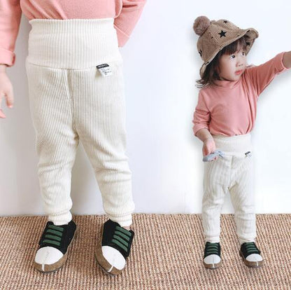Adorable baby crawling in comfortable ribbed cotton fleece-lined pants, suitable for everyday wear.