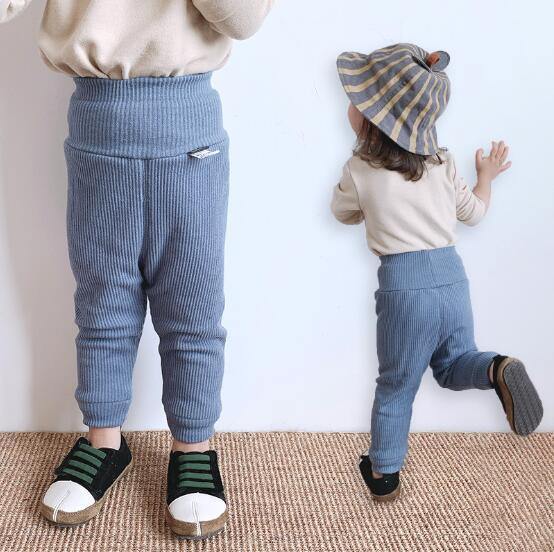 Stylish ribbed cotton fleece-lined pants for boys and girls, a must-have in kids fashion.