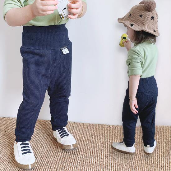 Warm and cozy unisex toddler ribbed cotton fleece-lined pants, crafted for ultimate comfort.
