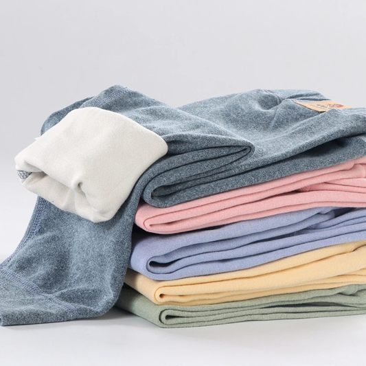 Warm fleece-lined thermal leggings for active kids, perfect for winter play & layering.