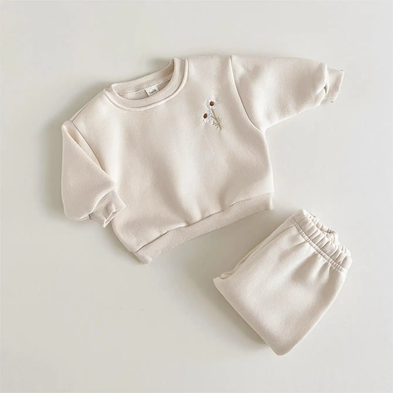 Comfortable floral embroidered cotton pants, part of a girls' winter tracksuit set