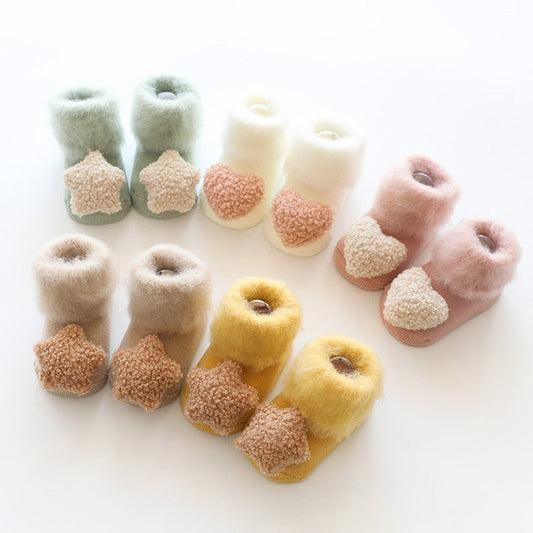 Warm fur-lined anti-slip baby socks for infants, perfect for winter comfort and safety.
