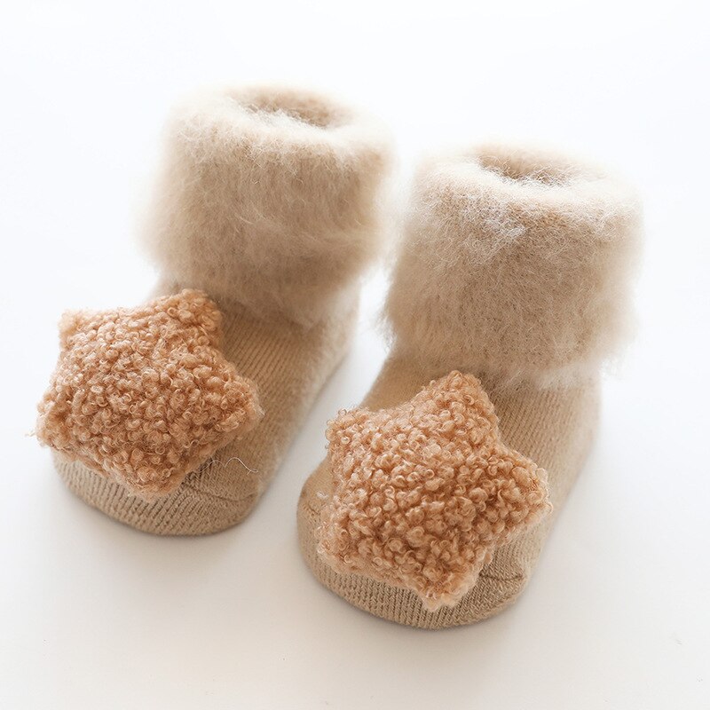 Unisex cozy toddler socks with soft fur lining, featuring anti-slip grippers for active babies.