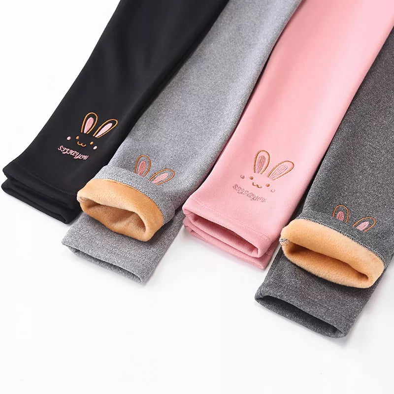 Warm girls' leggings with cute white rabbit print, perfect for cozy winter wear