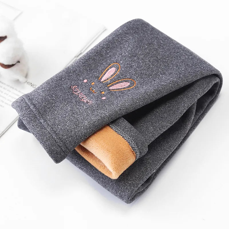 Girls' winter leggings with distinct rabbit illustrations, perfect for everyday wear