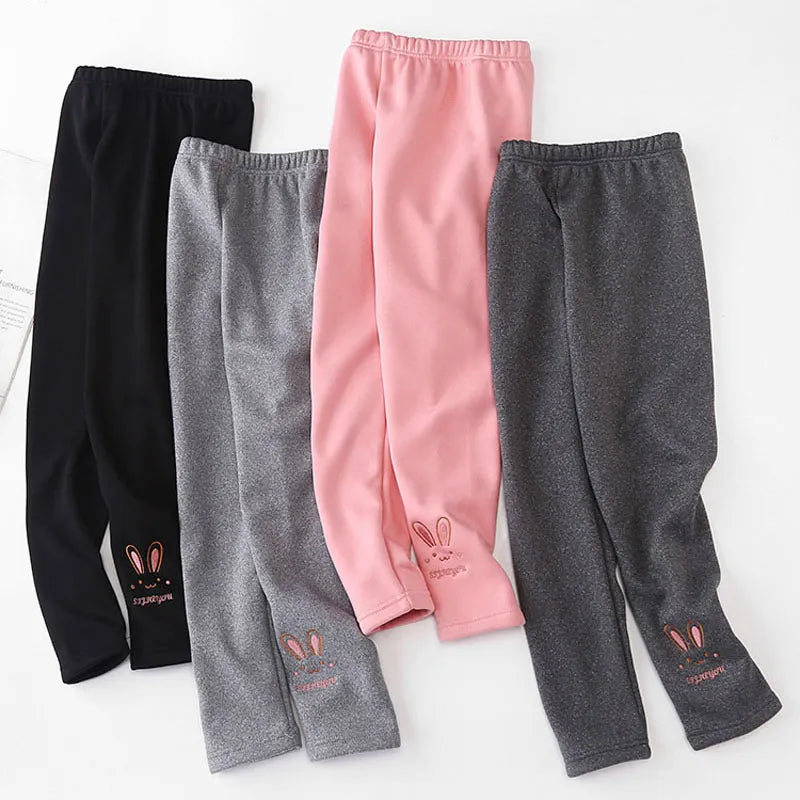 Soft pink toddler leggings featuring an adorable rabbit design, ideal for autumn outfits