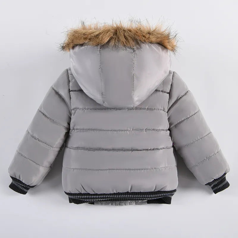 Patterned hooded puffer coat for kids, vibrant design, warm winter outerwear for boys and girls.