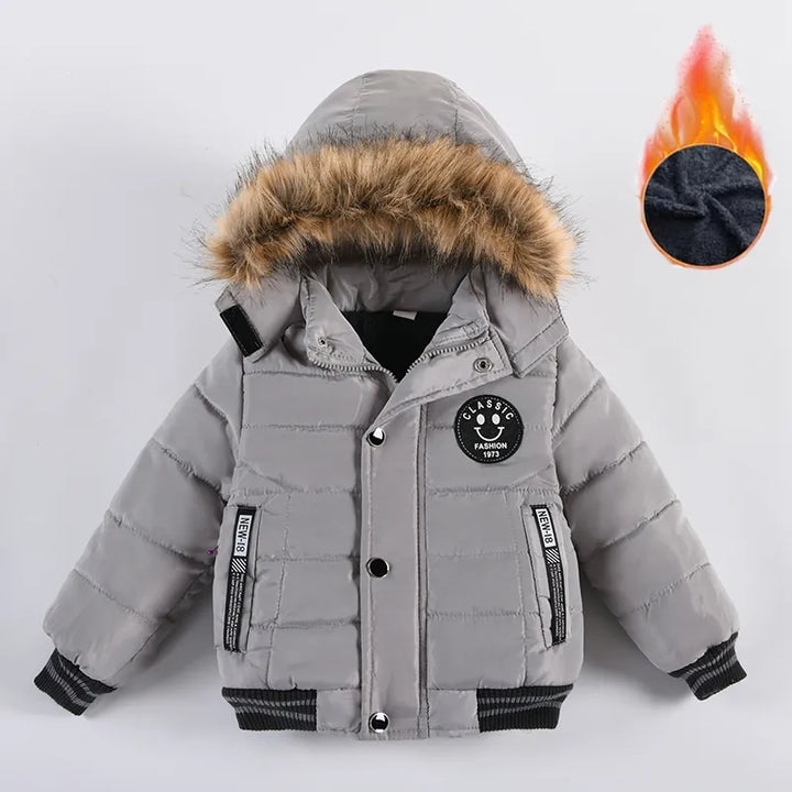 Red hooded winter puffer jacket for toddlers, boys and girls, featuring a cozy lining for cold weather.