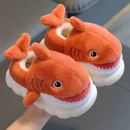 Playful blue cartoon shark cotton slippers for children. Soft, warm, and non-slip winter footwear.