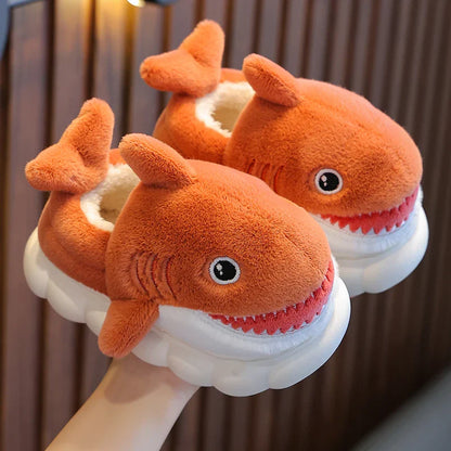 Durable non-slip winter cotton slippers for kids, featuring a cute cartoon shark design in blue.