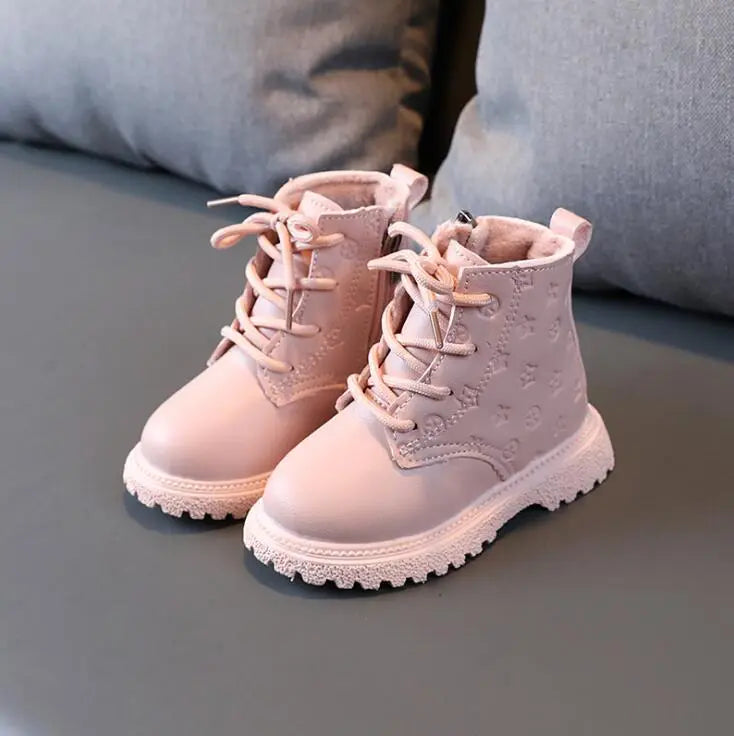 Fashionable kids' winter boots, plush-lined with durable laces, built for warmth