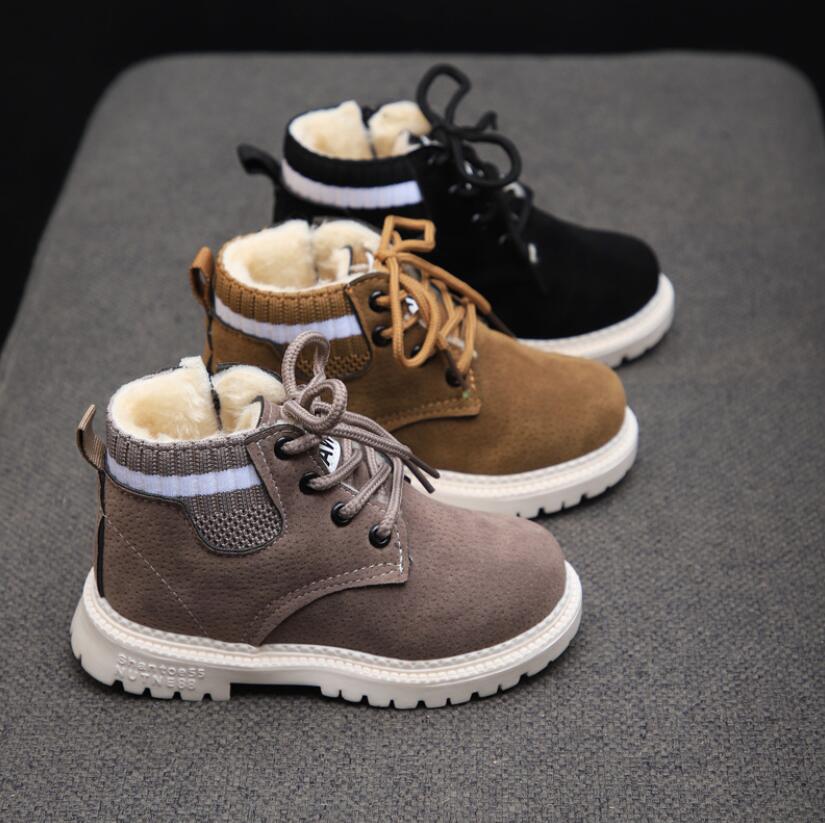 Warm kids' winter boots with plush lining, perfect for snow and cold weather