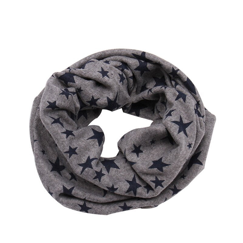 Children's warm neck warmer, baby accessory with a vibrant animal pattern, perfect for winter.