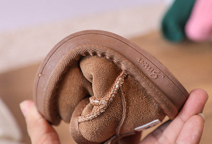 Unisex children's brown winter boots, plush-lined for ultimate warmth and comfort.