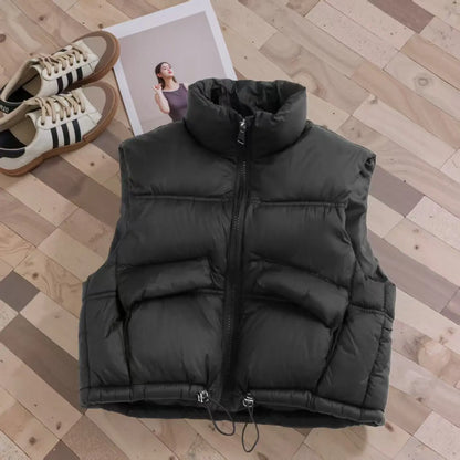 Grey puffer vest for children, versatile winter bodywarmer, essential cold weather gear