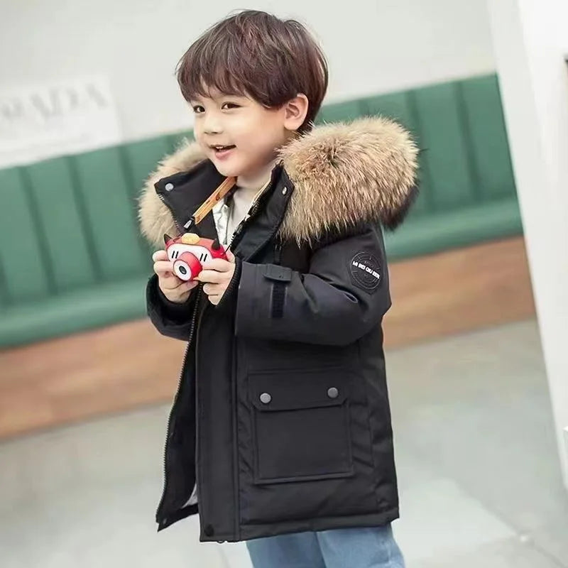 Stylish kids waterproof winter coat in green, designed for warmth and durability for active children.