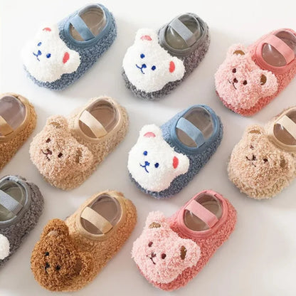 Warm, soft non-slip bear slippers for toddlers, cozy winter footwear for children's comfort.