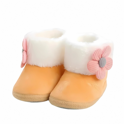 Pair of cozy blue unisex baby indoor booties, featuring a non-slip sole for safe toddler steps.