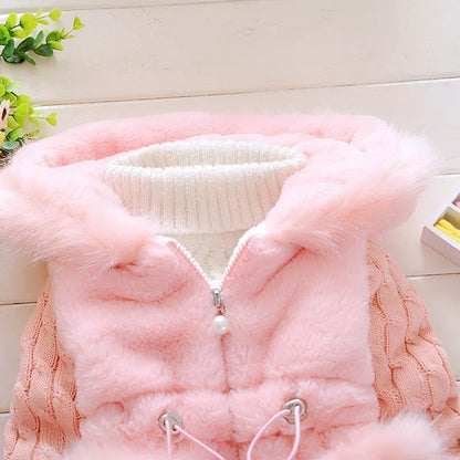 Back view of a girls' pink plush hooded jacket, showing the hood fully extended.