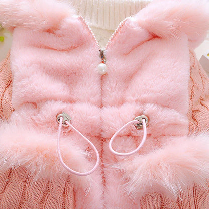Side profile of a baby girl's pink plush hooded winter coat, good for active toddlers.