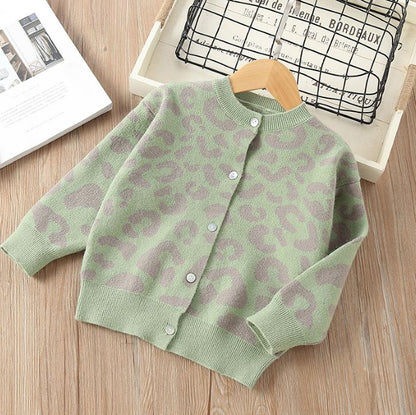 Toddler girl wearing a cozy leopard print cardigan, black and brown stylish sweater for kids' fashion