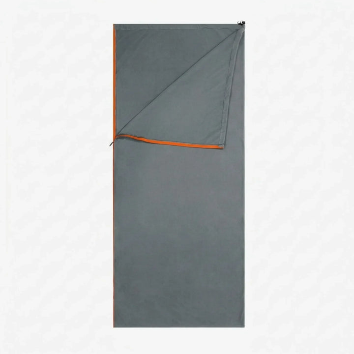 Lightweight fleece sleeping bag liner. Compact & soft, perfect for travel, camping, and hiking warmth.