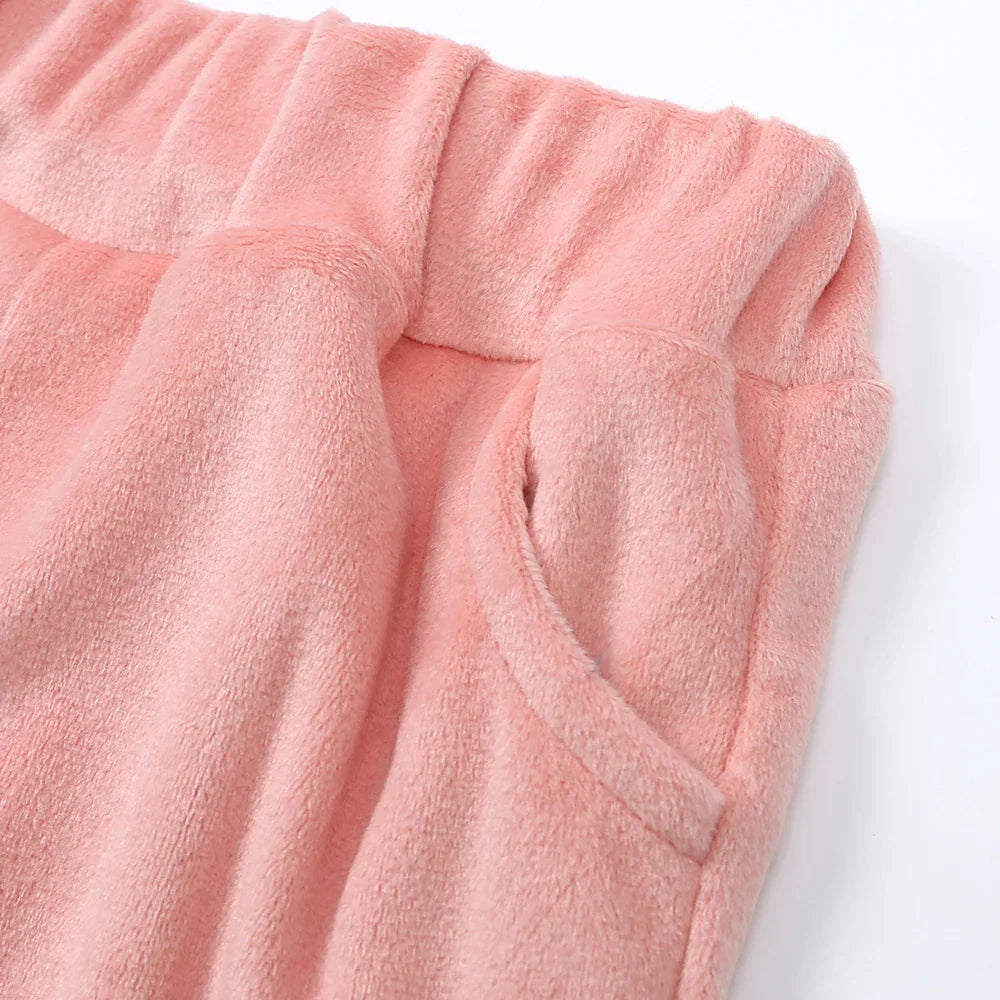 Kids' winter wear: a vibrant velvet tracksuit with a full-length zipper