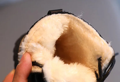 Unisex kids' autumn/winter cotton boots, designed for comfort and warmth in cold temperatures.