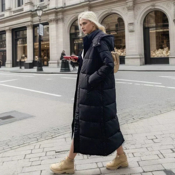 Heavy-duty women's long winter coat, excellent cold weather protection.