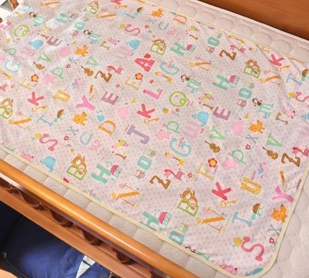 Washable and waterproof diaper changing pad for busy parents.