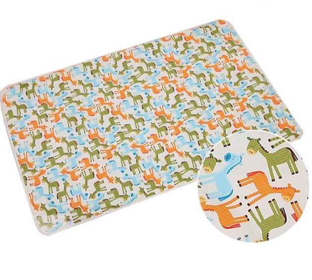 Compact travel baby gear: diaper changing mat, easy to carry.