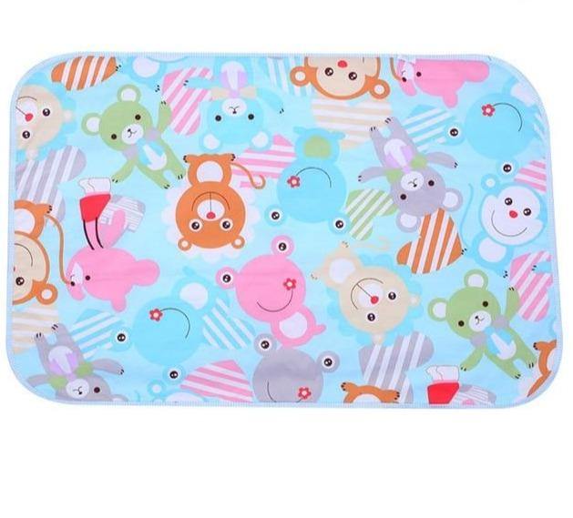 Infant care essential: waterproof changing pad with secure straps.