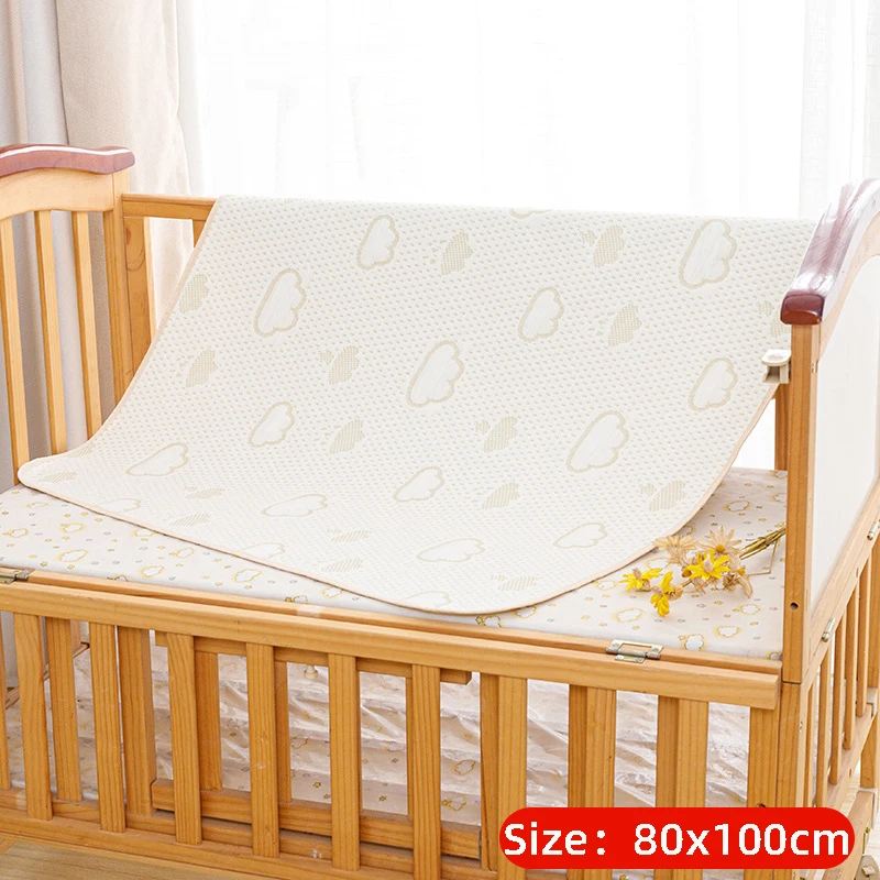 White waterproof mattress cover for children's beds, providing hygienic and dry sleeping