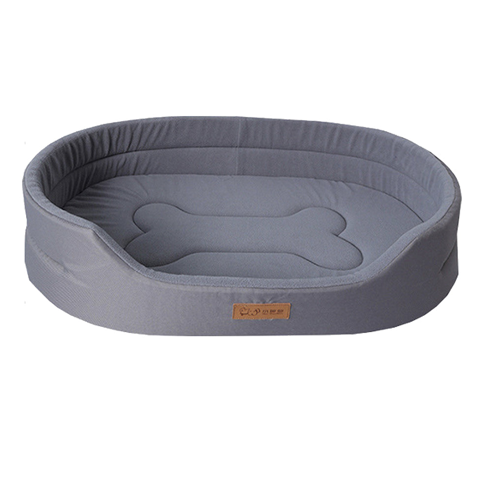 Cozy pet bed: waterproof, orthopedic, and plush for a happy, well-rested dog.