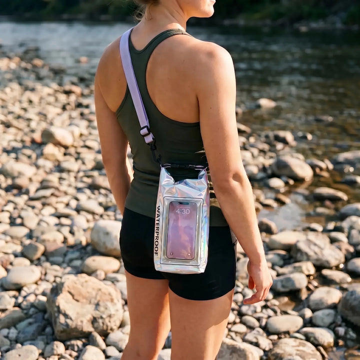 Waterproof roll-top dry bag with phone window, perfect for kayaking & outdoor adventures.