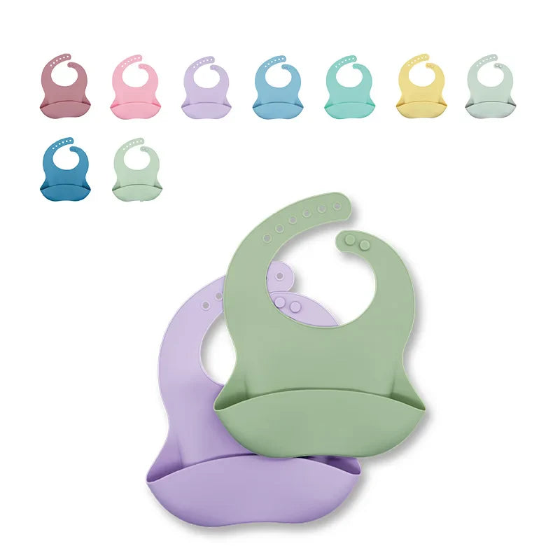 Easy-clean waterproof baby bib with a playful cartoon elephant design.