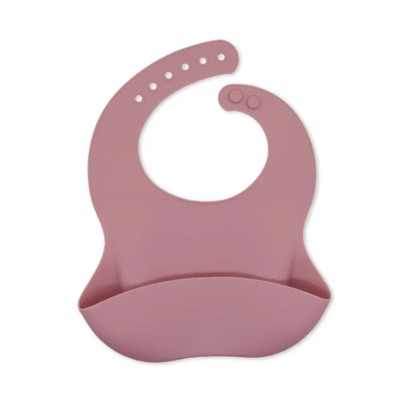 Toddler waterproof bib made of silicone, decorated with a cartoon monkey print.
