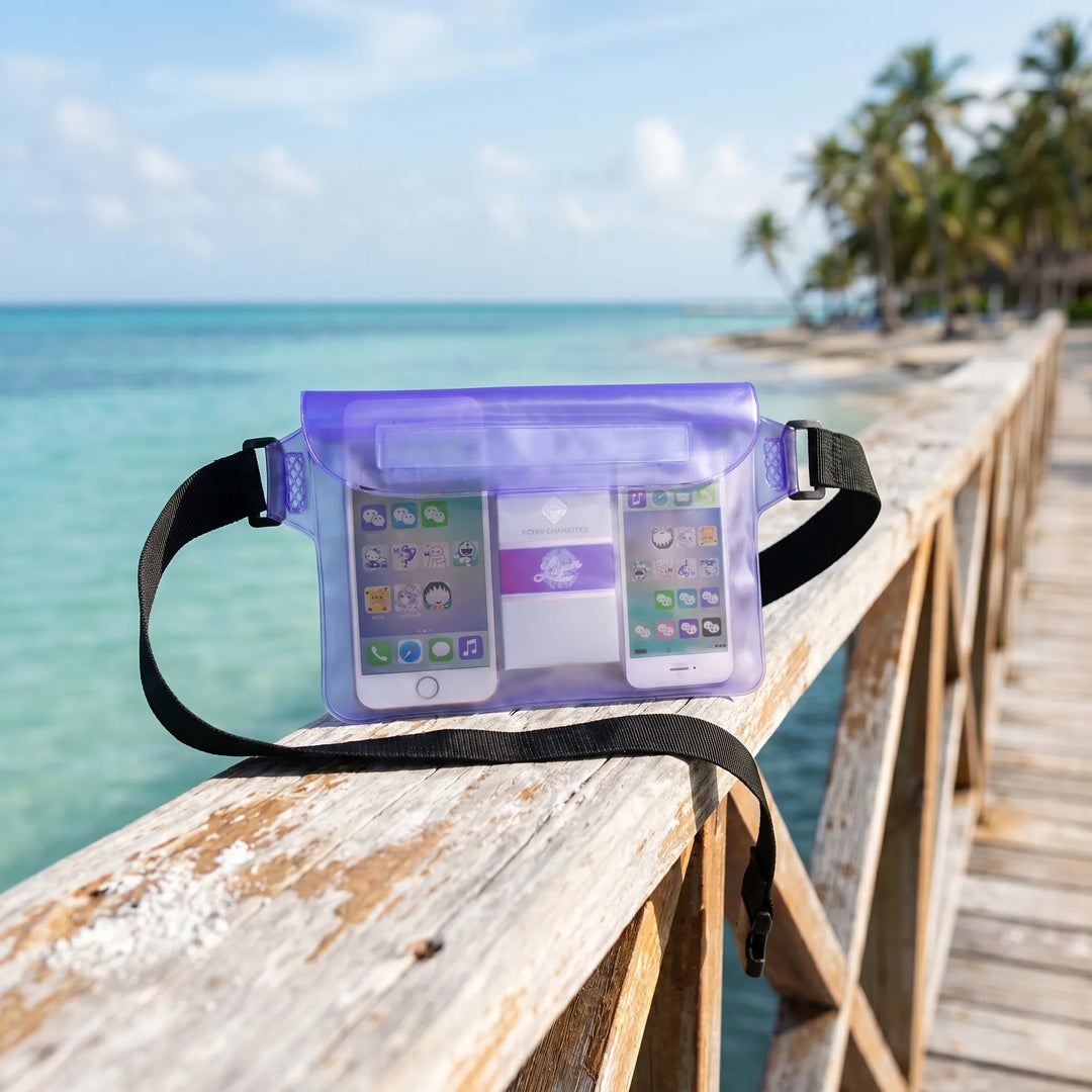 Waterproof waist pack with a smartphone visible inside. Essential translucent dry bag for beach, travel & outdoor use.