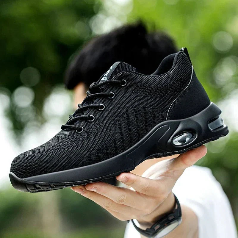 Protective WERKTRITT men's steel toe work boots, essential safety footwear for hazardous industrial conditions.