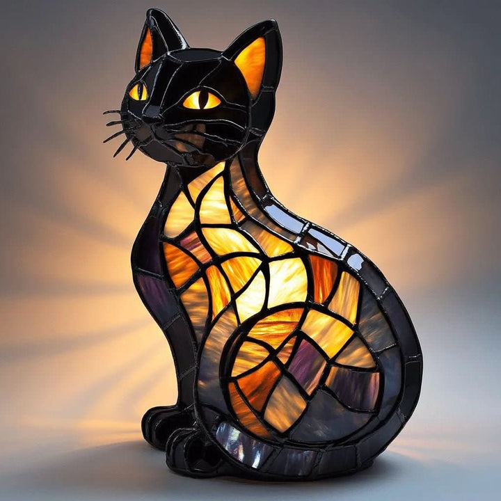 Soft silicone cat LED lamp with touch control, a portable ambient night light for home decor.