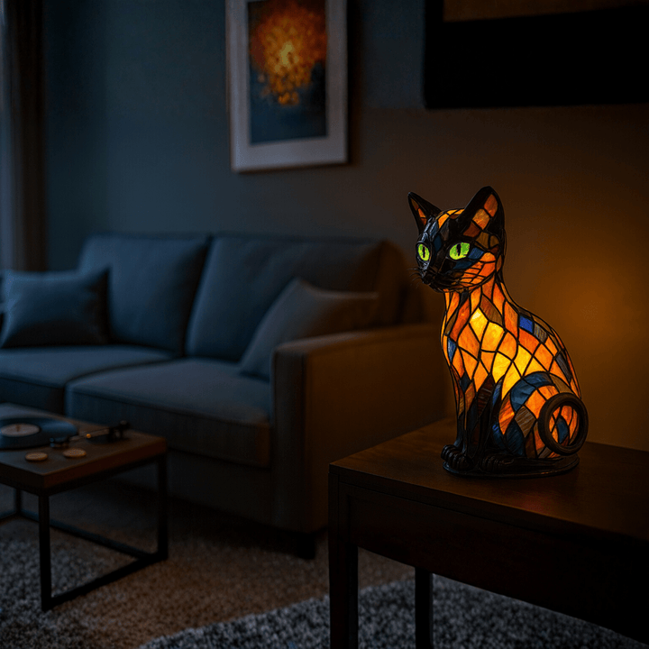 Portable LED cat night light offering gentle, ambient illumination for a cozy bedroom or nursery.